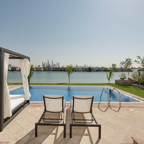 Lounge poolside, slipping into the cool water when the heat gets a bit much
