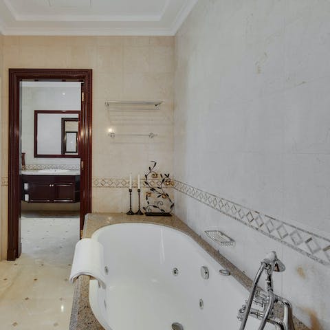 Treat yourself with a glass of Prosecco and a luxurious bubble bath