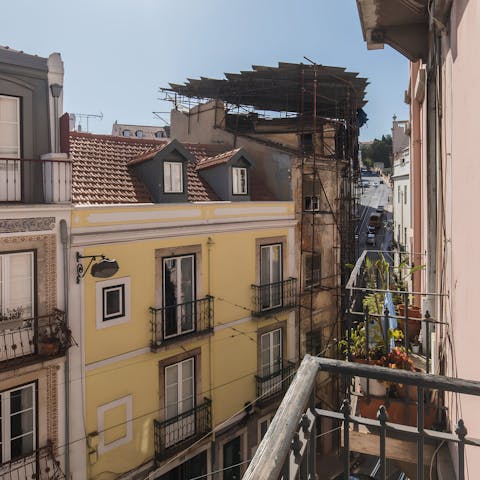 Sip coffee on the balcony and watch the winding streets below
