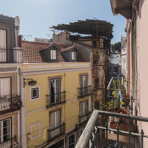 Sip coffee on the balcony and watch the winding streets below