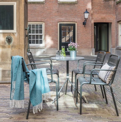 Have drinks and make some friends in the courtyard