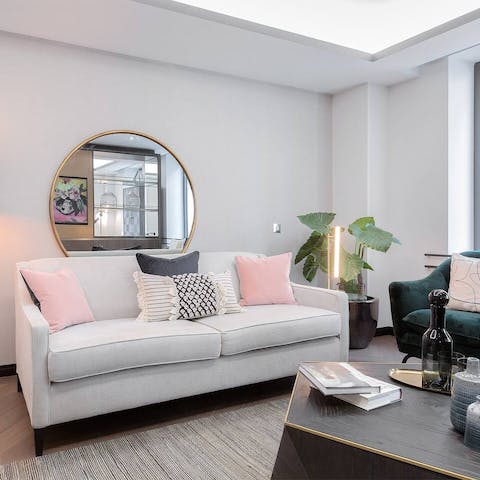 Curl up on the sofa in the elegant living area for a quiet night in