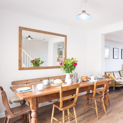 Gather around the rustic dining table for hearty family dinners at home