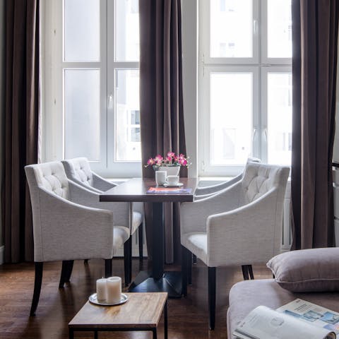 Come together around the light-filled dining table for lazy breakfasts