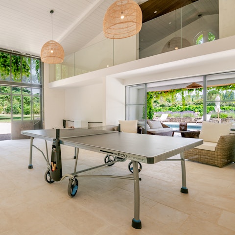 Take a break from the pool with a game of ping pong
