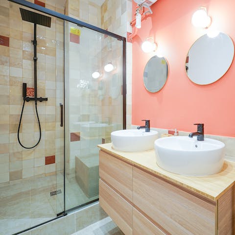 Get ready for a night out in Paris in the salmon pink bathroom