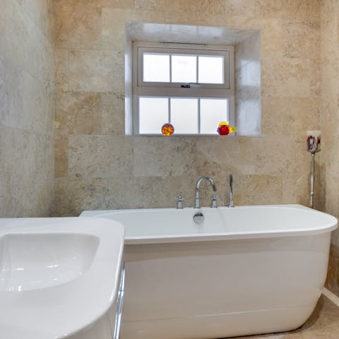 Soak all night in the bath tub after a long day of hiking in the countryside