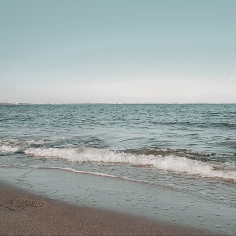 Spend days on the sandy beach – just a short walk from your door