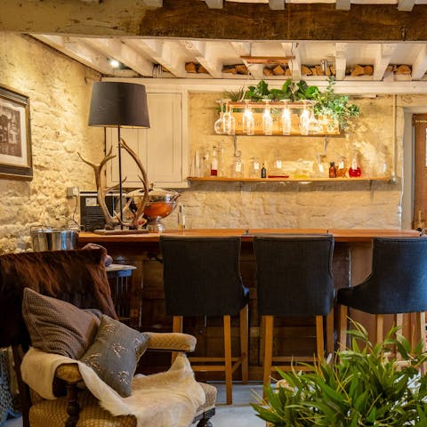 Unwind with a game of darts in the private pub