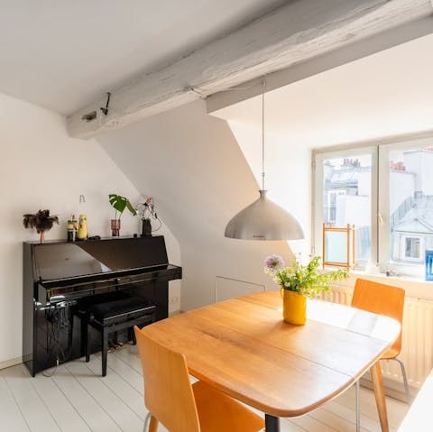 Tinkle a tune on the piano in the light-filled living space