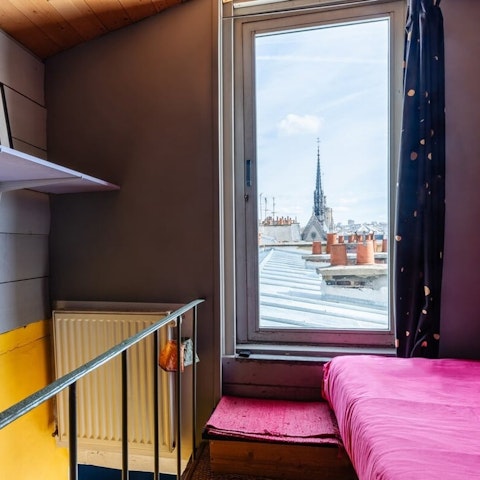 Wake up to views over the Parisian rooftops