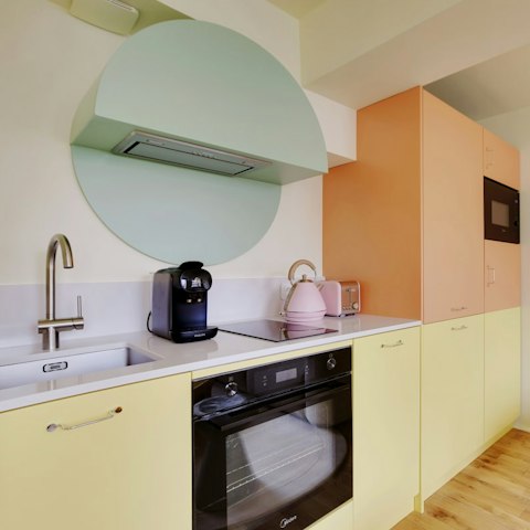Cook in the pastel-hued kitchen or dine out nearby