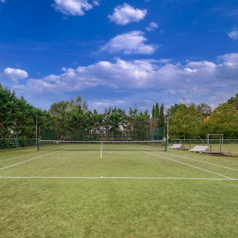Work up a sweat playing tennis, volleyball, and football at this sporty home