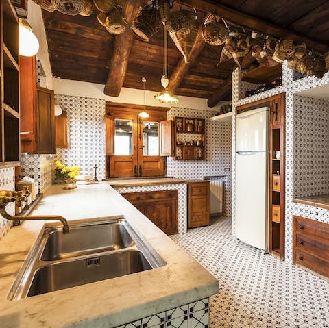 Rustle up bruschetta and pasta in the hand-tiled kitchen, using produce from the farm