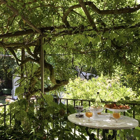 While away afternoons in the enchanting garden, drinking wine and exploring the vegetable gardens