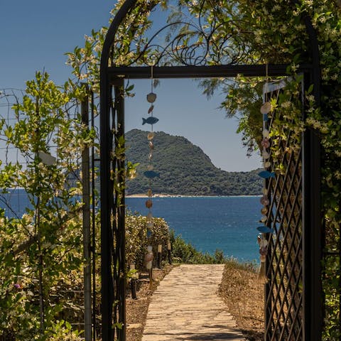 Enjoy a soothing sea breeze as you stretch out beside the private swimming pool