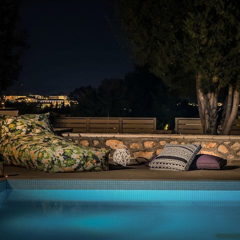Sip cocktails beside the pool when the sun has set and the stars have emerged