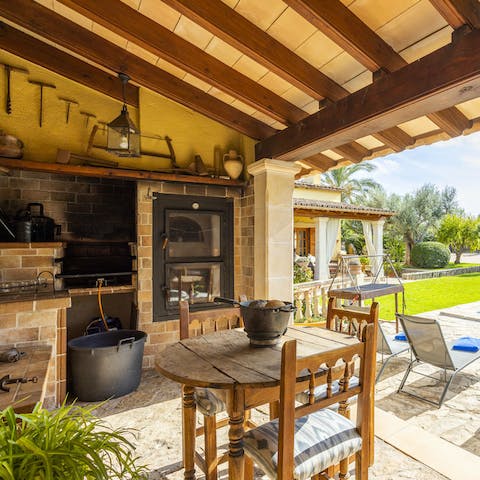 Grill up some spicy Spanish sausages in your outdoor kitchen