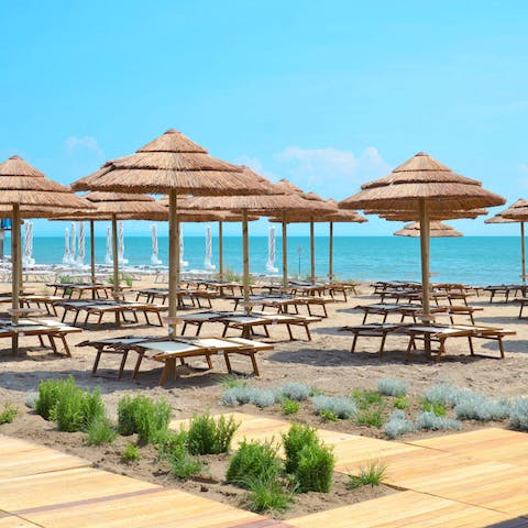 Bag your space on the resort's private beach