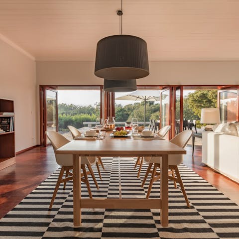 Dine in the sunny open-plan living space