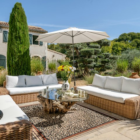 Gather for drinks in the picturesque garden