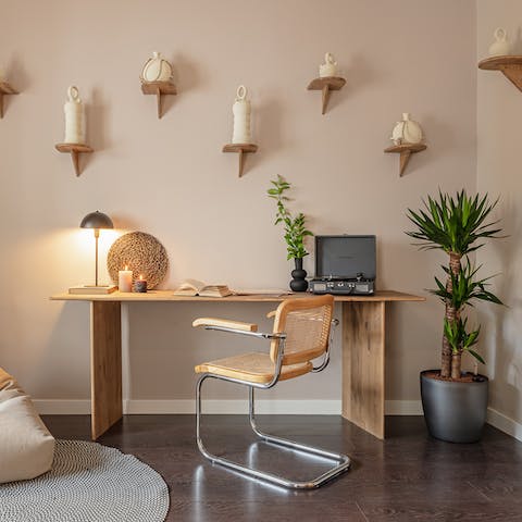 Catch up on emails or share your experiences with friends from the beautifully crafted desk