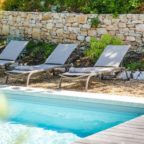 Lounge by the private pool after enjoy a gentle swim