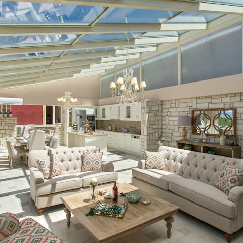 Enjoy some shade in the impressive glass atrium