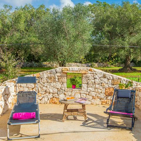 Soak up the Mediterranean sun from the terrace loungers