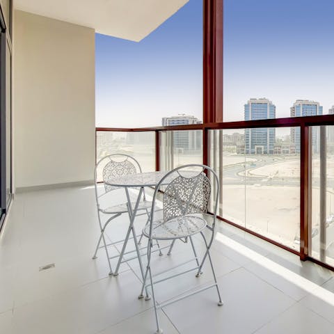 Take your morning coffee out to the balcony for a sunny start to the day, catching up on the evening's news