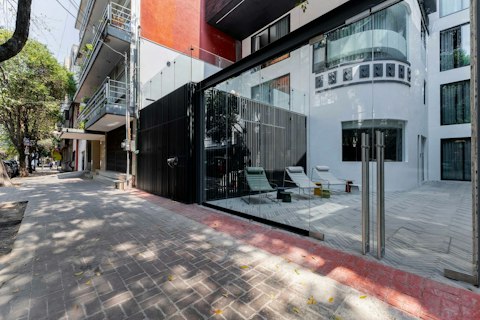 Unwind on the shared terrace steps from a tree-lined street