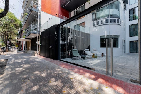 Unwind on the shared terrace steps from a tree-lined street