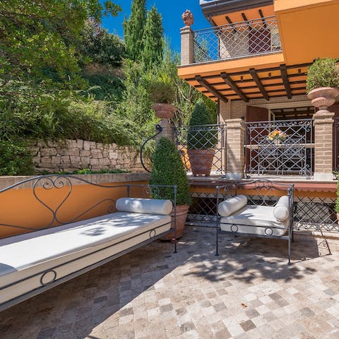 Gather for drinks with family and friends on the terrace