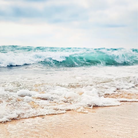Catch some waves at Plage des Estagnots, a twenty-minute walk away