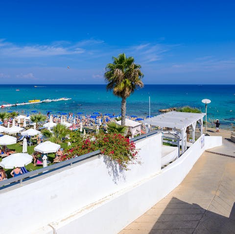 Stay just a five-minute walk away from the turquoise shores of Sunrise Beach