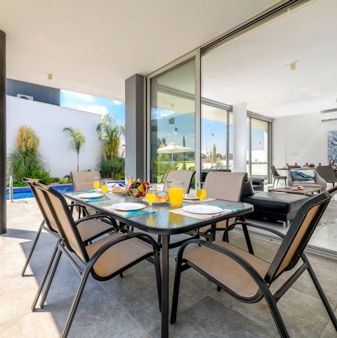 Gather around the alfresco dining area for a sunny breakfast of champions