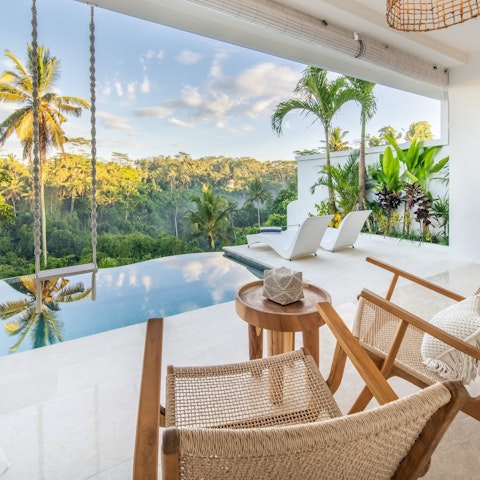 Enjoy an aperitif alongside jungle views