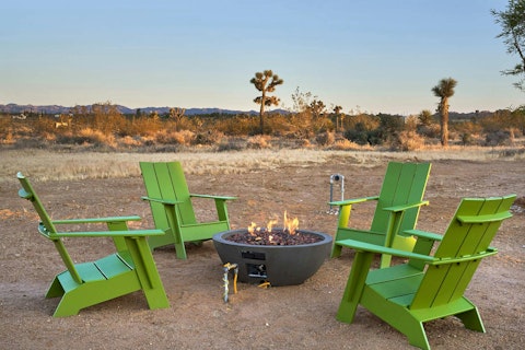 Toast marshmallows around the fire pit as dusk draws in