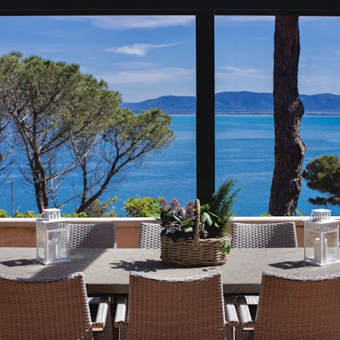 Dine on the terrace with a stunning sea view