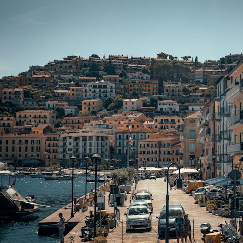 Explore  Porto Santo Stefano's picturesque harbour