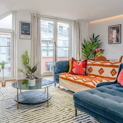 Open up the floor-to-ceiling Juliet balcony doors to let the sunlight in