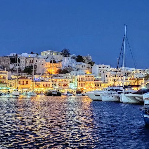 Head to Naxos Town, just 10km from your villa, and enjoy some moussaka in a traditional Greek taverna