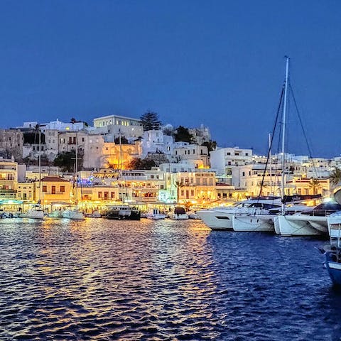 Head to Naxos Town, just 10km from your villa, and enjoy some moussaka in a traditional Greek taverna