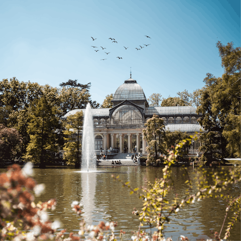 Enjoy morning strolls through El Retiro Park, a short walk away