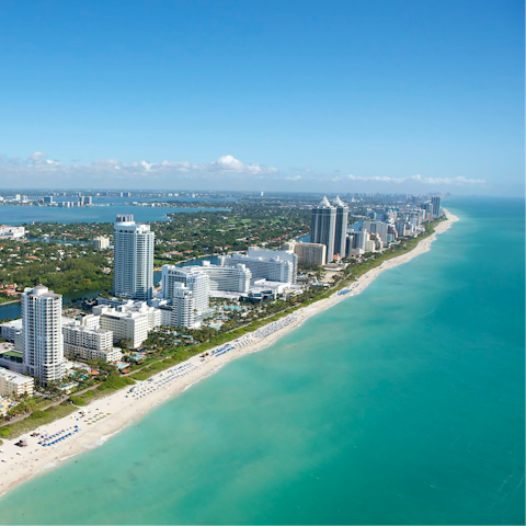 Spend sunny afternoons on the beaches of Miami, 4 miles away
