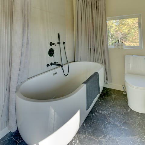 Sink into a hot bath in the en-suite's large standalone tub