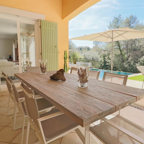 Enjoy meals alfresco on the covered patio