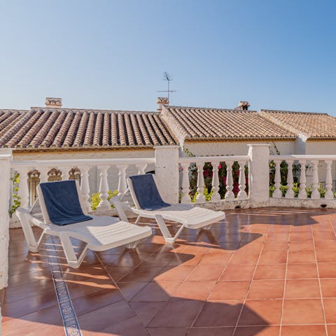 Soak up the sun while you lounge on the terrace and sip on a glass of Cava