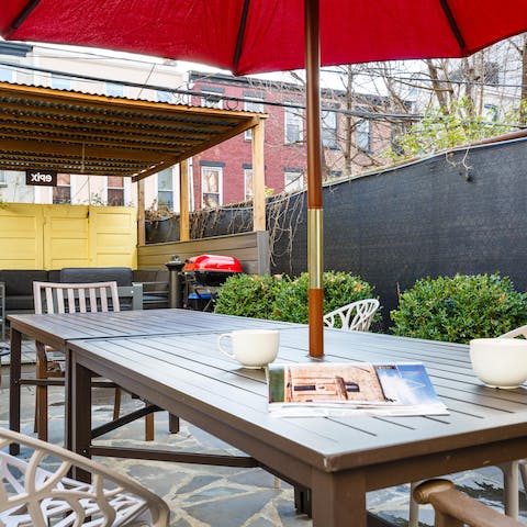 Gather the whole group for a barbecue in the back yard