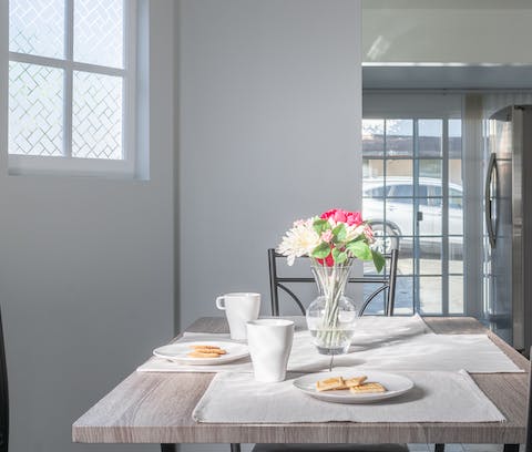 Enjoy an American breakfast of pancakes and syrup at the quaint dining spot